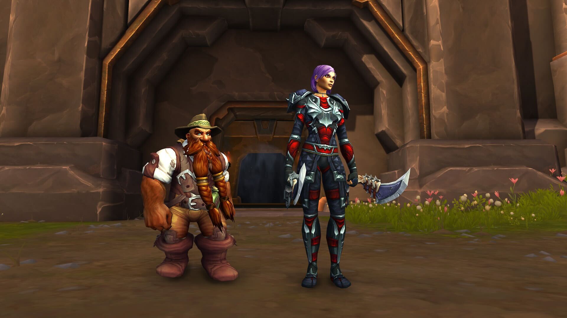 Brann Bronzebeard standing next to a Human Female character